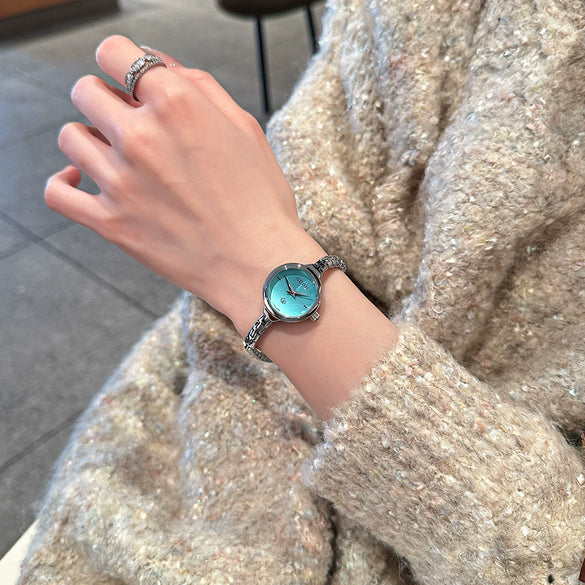Women's Alloy Quartz Watch Round Dial Retro Fashion Style Jewelry Buckle Mineral Reinforced Glass Mirror