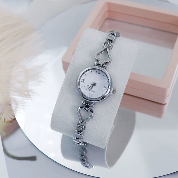 Women's Alloy Quartz Watch Round Dial Stainless Steel Buckle Mineral Reinforced Mirror