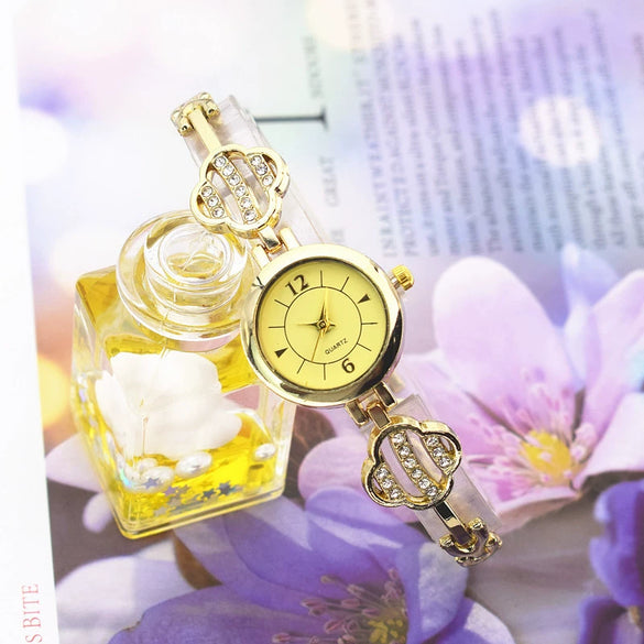 Women's Alloy Round Dial Leisure Fourleaf Clover Quartz Bracelet Watch
