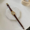 Women's Alloy Round Dial Mini Brown Watch With Printed Logo Pin Buckle Ordinary Glass Mirror Pointer Display Retro Style