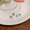 Women's Alloy S925 Silver Needle Blue Opalite Moon Bow Electroplated Earrings