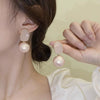 Women's Alloy S925 Silver Needle Champagne Pearl Geometric Electroplated Light Luxury Elegant Earrings