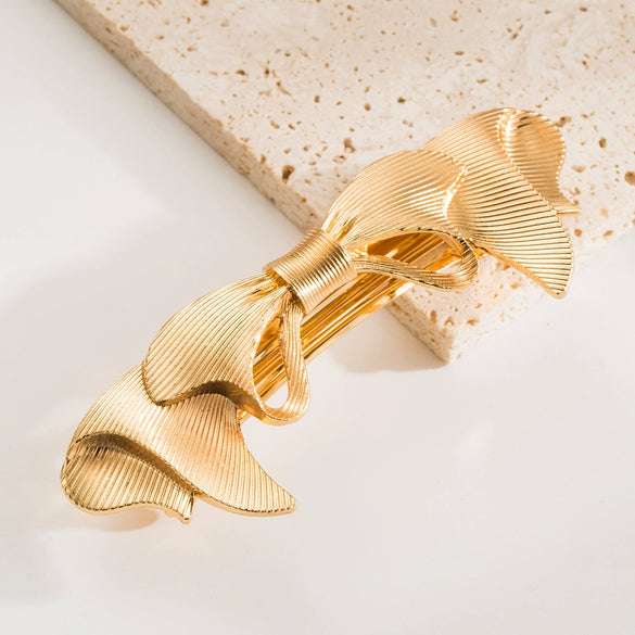 Women's Alloy Twist Bow Spring Clip Hair Accessories With Electroplating