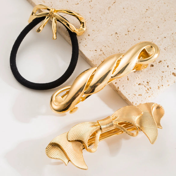 Women's Alloy Twist Bow Spring Clip Hair Accessories With Electroplating