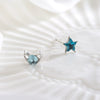 Women's Asymmetric Star And Moon Earrings In Sterling Silver With Blue Zircon And Diamond Accents