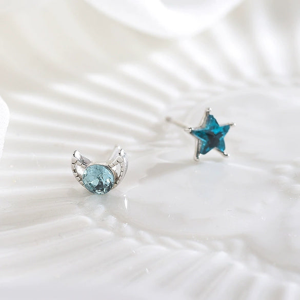Women's Asymmetric Star And Moon Earrings In Sterling Silver With Blue Zircon And Diamond Accents