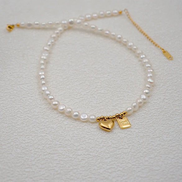 Women's Baroque Freshwater Pearl And Titanium Steel Geometric Handmade Pendant Necklace With Cross Chain