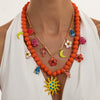 Women's Bohemian Floral Geometric Alloy Pendant Necklace With Handmade Resin Beading And Lobster Clasp
