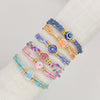 Women's Bohemian Style Handwoven Glass And Glaze Beaded Bracelet With Geometric Pattern
