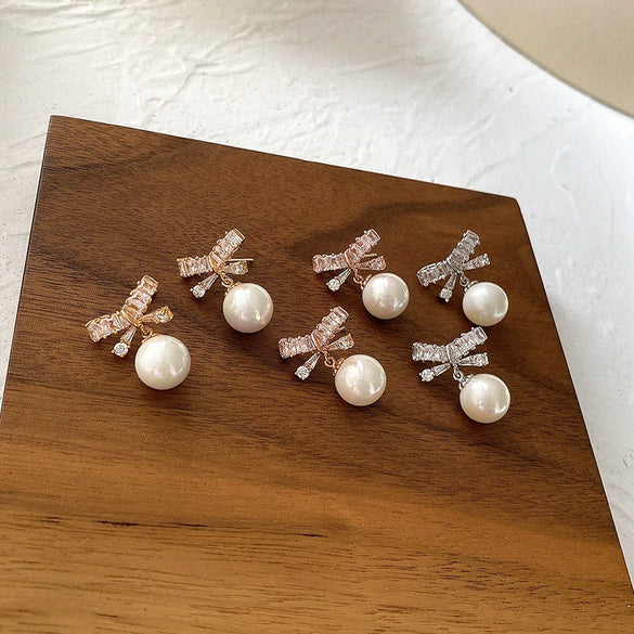 Women's Bow Imitation Pearl Earrings With Silver Needle Electroplated For High End Autumn And Winter