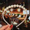 Women's Bridal Pearl Headband With Handknitted Knotted Design And Elegant Bow Crown Detail