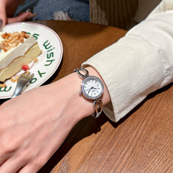 Women's Casual Elegant Alloy And Stainless Steel Quartz Bracelet Watch With Round Dial And Rhinestone Frame