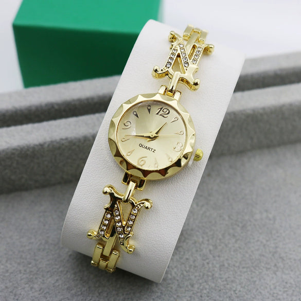 Women's Casual Metal And Stainless Steel Quartz Bracelet Watch With Round Dial