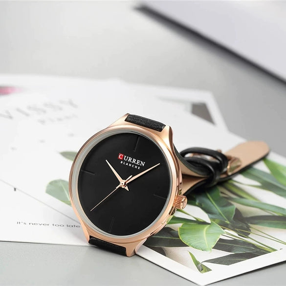 Women's Casual Quartz Watch Metal Case Imitation Leather Strap Round Dial Mineral Strengthened Glass Mirror