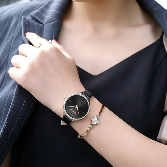 Women's Casual Quartz Watch Metal Case Imitation Leather Strap Round Dial Mineral Strengthened Glass Mirror