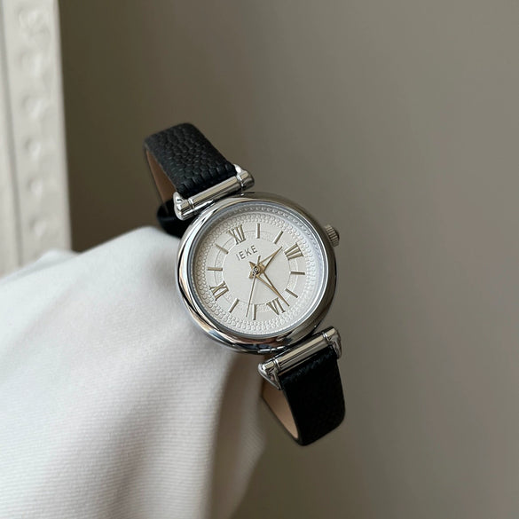 Women's Casual Round Alloy Case Imitation Leather Strap Watch With Roman Numeral Retro Style
