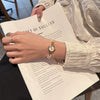 Women's Casual Round Dial Alloy Case Pearl Bracelet Watch With Stainless Steel Jewelry Buckle