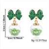 Women's Christmas Bow And Snowflake Bell Dangle Earrings With Transparent Quicksand Ball Design Alloy Electroplated Holiday Jewelry