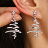 Women's Christmas Cartoon Earrings Alloy Electroplated Holiday Character Reindeer And Gift Designs With Steel Ear Needles