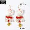 Women's Christmas Red Bow Bell Tassel Earrings With Electroplated Alloy Design And Plush Santa Claus Detail