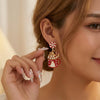 Women's Christmas Sleigh Drop Earrings Electroplated Alloy With Red And Green Contrast Ball Details And Stainless Steel Ear Posts