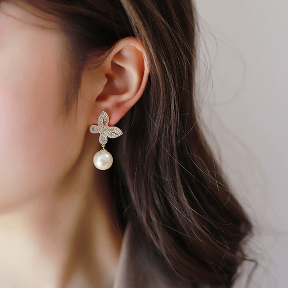 Women's Copper Butterfly Inlaid Zircon Imitation Pearl Elegant Fashion Earrings With Geometric Animal Zodiac Design