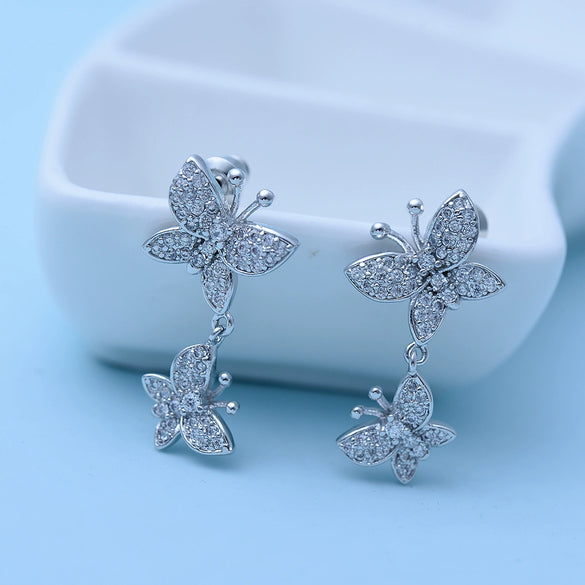 Women's Copper Double Bow Earrings With Zircon Inlay And Electroplated Finish Fashion Jewelry Wholesale