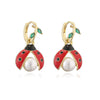 Women's Copper Earrings With Ladybird Insect And Star Pattern And Zirconia Design
