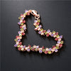 Women's Copper Four Leaf Clover Bracelet With Colorful Zircon Inlay And Gold Tone Leaf Design
