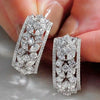 Women's Copper Hollow Carved Flower Zirconia Earrings
