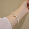 Women's Copper Natural Freshwater Pearl Bracelet With Hangable Pendant In Rice And Droplet Shapes 14K Gold Injected Trendy Design