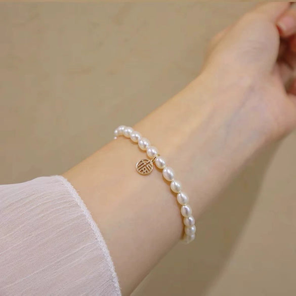 Women's Copper Natural Freshwater Pearl Bracelet With Hangable Pendant In Rice And Droplet Shapes 14K Gold Injected Trendy Design