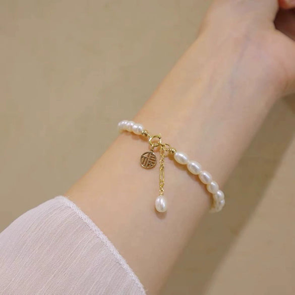 Women's Copper Natural Freshwater Pearl Bracelet With Hangable Pendant In Rice And Droplet Shapes 14K Gold Injected Trendy Design