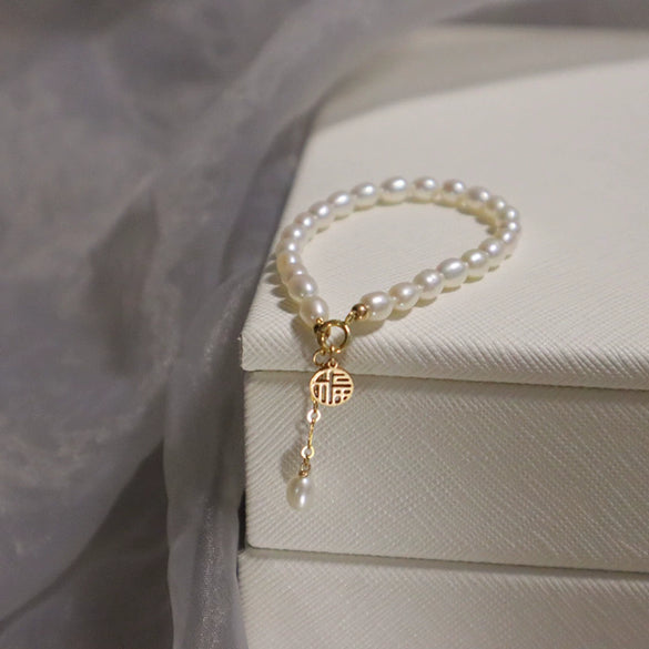 Women's Copper Natural Freshwater Pearl Bracelet With Hangable Pendant In Rice And Droplet Shapes 14K Gold Injected Trendy Design