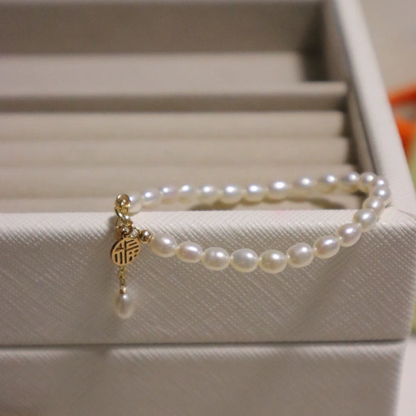 Women's Copper Natural Freshwater Pearl Bracelet With Hangable Pendant In Rice And Droplet Shapes 14K Gold Injected Trendy Design