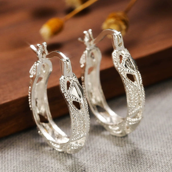 Women's Creative Simple Geometric Flower Copper Earrings With Electroplating