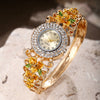 Women's Diamonddecorated Carved Flower Quartz Watch Hollow Alloy Bracelet Round Dial Fashion