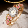 Women's Diamonddecorated Carved Flower Quartz Watch Hollow Alloy Bracelet Round Dial Fashion