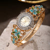 Women's Diamonddecorated Carved Flower Quartz Watch Hollow Alloy Bracelet Round Dial Fashion