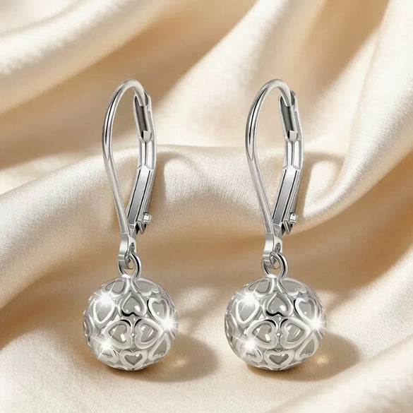 Women's Electroplated Copper Hollow Heart Drop Pendant Earrings With Glossy Three Dimensional Design And Elegant Literary Style