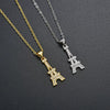 Women's Electroplated Copper Iron Tower Pendant Necklace With Cz Accent And Cross Chain Design