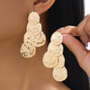Women's Electroplated Iron Alloy Flower Pendant Earrings With Hammered Texture Irregular Sequin Details And Stainless Steel Ear Needles