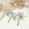 Women's Electroplated Metal Bow Tassel Earrings With Zircon Accents Simple Ribbon Style Artistic Jewelry