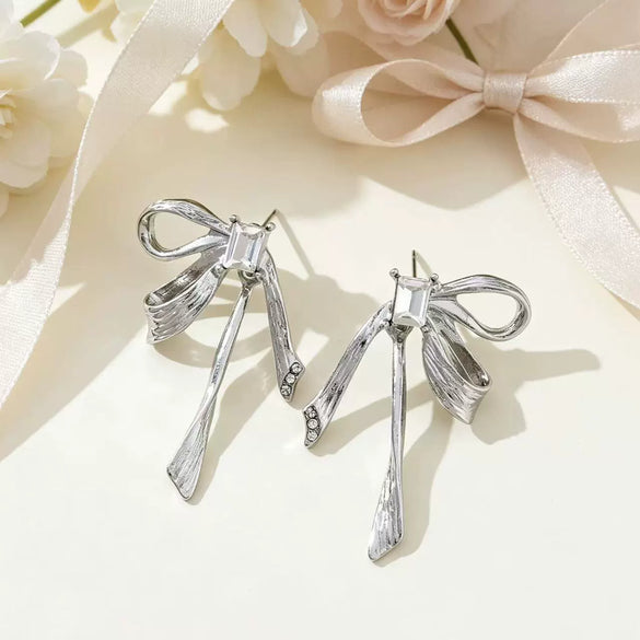 Women's Electroplated Metal Bow Tassel Earrings With Zircon Accents Simple Ribbon Style Artistic Jewelry