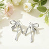 Women's Electroplated Metal Bow Tassel Earrings With Zircon Accents Simple Ribbon Style Artistic Jewelry