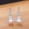 Women's Elegant Copper Imitation Pearl Flower Geometric Earrings
