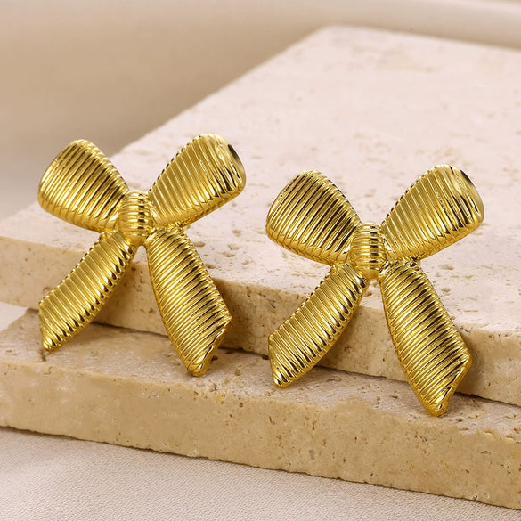 Women's Elegant Light Luxury Titanium Steel Earrings With Bow Pattern And 18K Gold Plated Electroplating Design