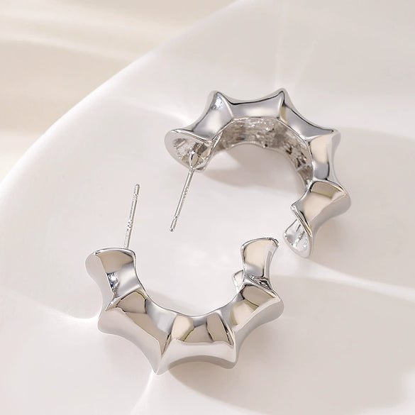 Women's Exaggerated Geometric Letter Earrings In Goldplated Metal With A Bambooinspired Cshaped Minimalist Design