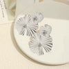 Women's Exaggerated Geometric Metal Sequin Stud Earrings With Electroplated Finish And Elegant Fashion Styling