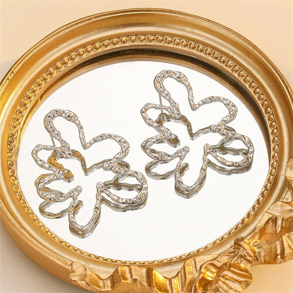 Women's Exaggerated Hollow Floral Earrings In Electroplated Zinc Alloy With A Simple Elegant Design